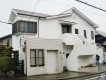 岸和田市上松町のアーバントーンが映える外壁塗装の現況