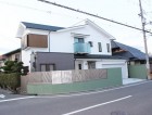 岸和田市上松町の屋根スレート瓦の下屋部分の葺き替え作業完了
